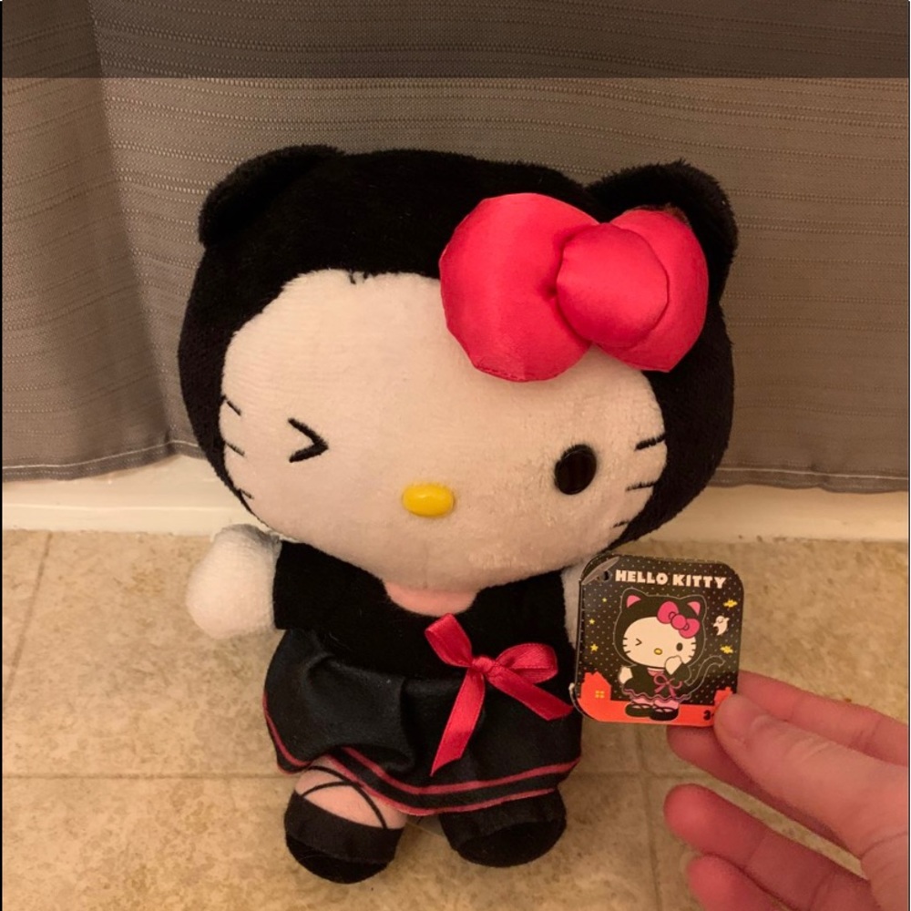 [SOLD] Little Hello Kitty stuffed animal & NEW Hello Kitty O.P.I Nail Polish